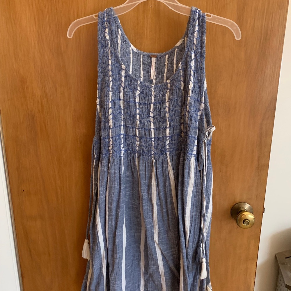 Never worn!  Free people